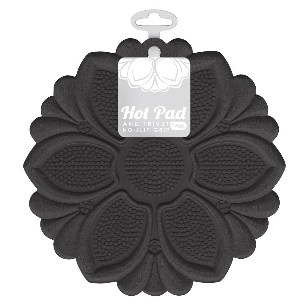 Black floral-patterned hot pad with a label on a white background